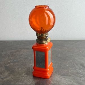 Orange painted glass oil lamp with mirrors